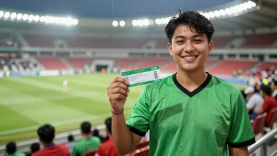 A photo of a young supporter holding a ticket and smiling, with a blurred background of a stadium, taken in a floodlit...