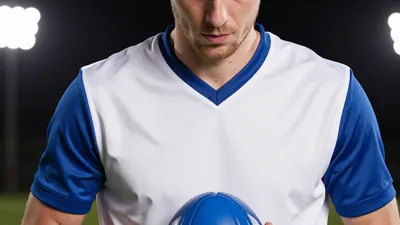 A photorealistic image of an anonymous Oldham player in a white jersey with blue sleeves and a blue bib, with a blue ball...